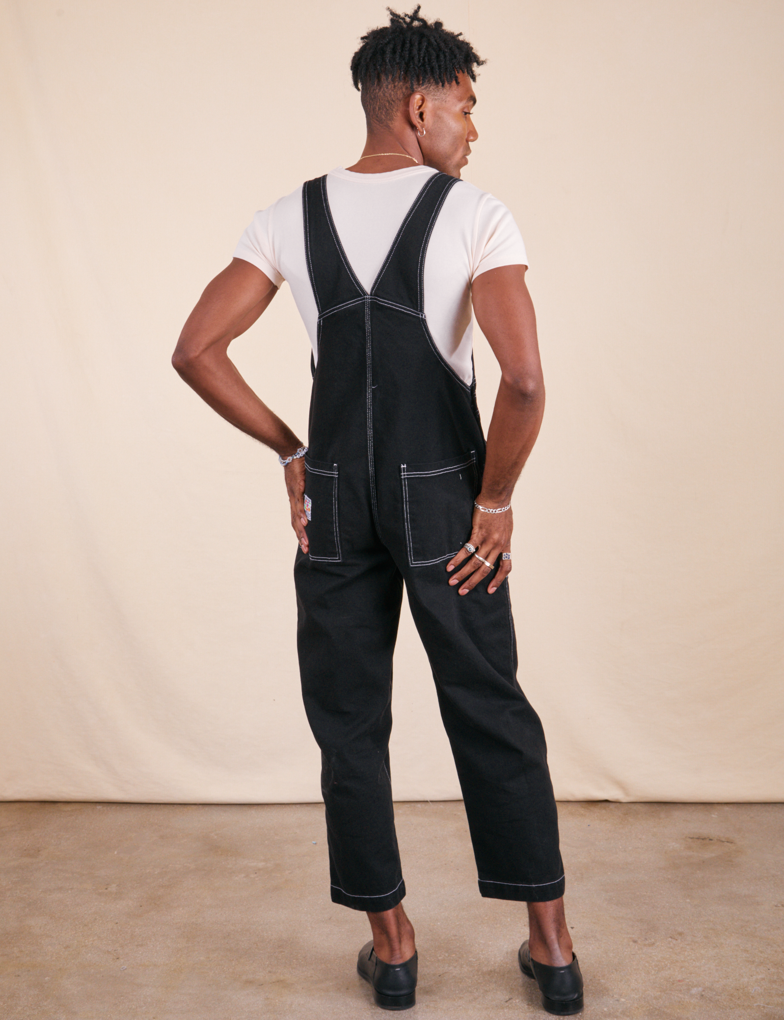 Back view of Original Overalls in Basic Black worn by Jerrod
