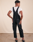 Back view of Original Overalls in Basic Black worn by Jerrod