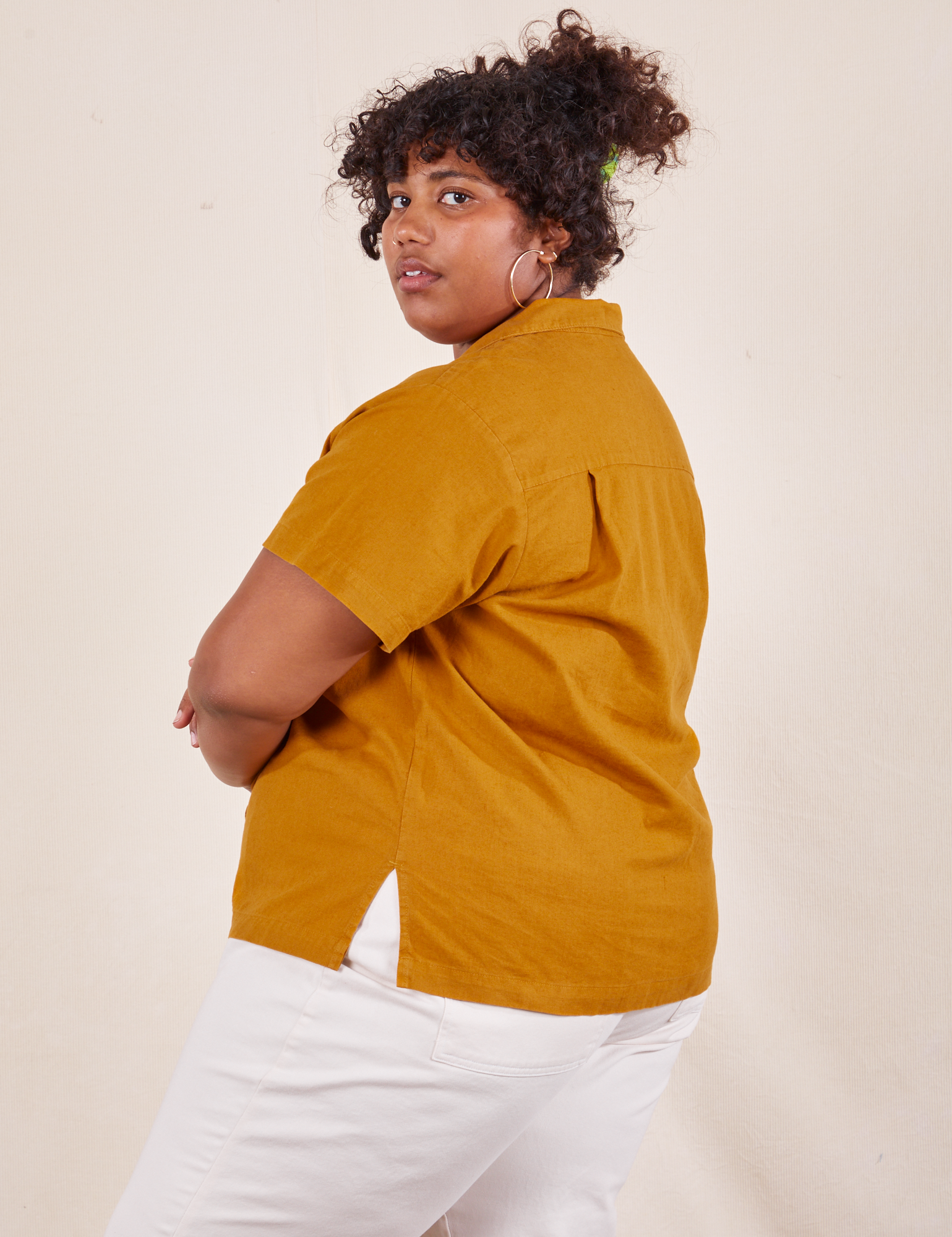 Side view of Pantry Button-Up in Spicy Mustard worn by Morgan