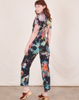 Short Sleeve Jumpsuit in Rainbow Magic Waters side view on Alex