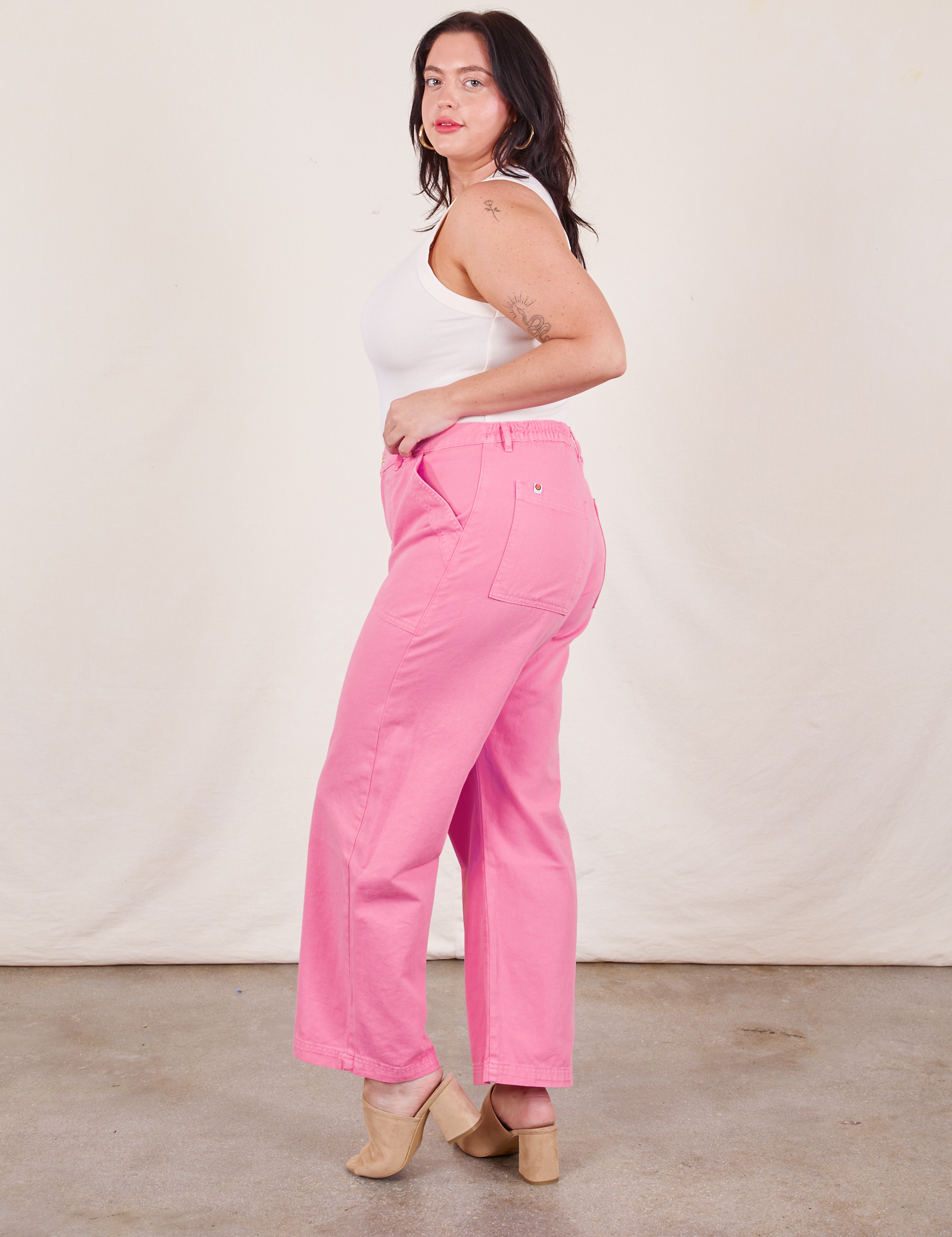 Side view of Work Pants in Bubblegum Pink on Faye