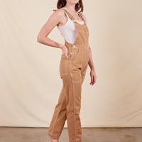 Side view of Original Overalls in Tan worn by Alex