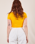 Back view of Baby Tee in Sunshine Yellow on Alex