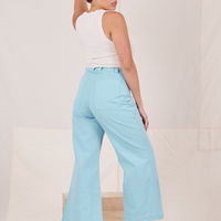 Back view of Bell Bottoms in Baby Blue and vintage off-white Tank Top worn by Tiara