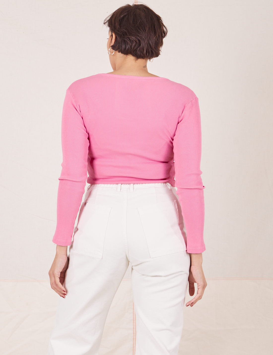 Back view of Long Sleeve V-Neck Tee in Bubblegum Pink worn by Tiara