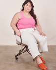 Tank Top in Bubblegum Pink on Ashley wearing vintage off-white Western Pants sitting in chair