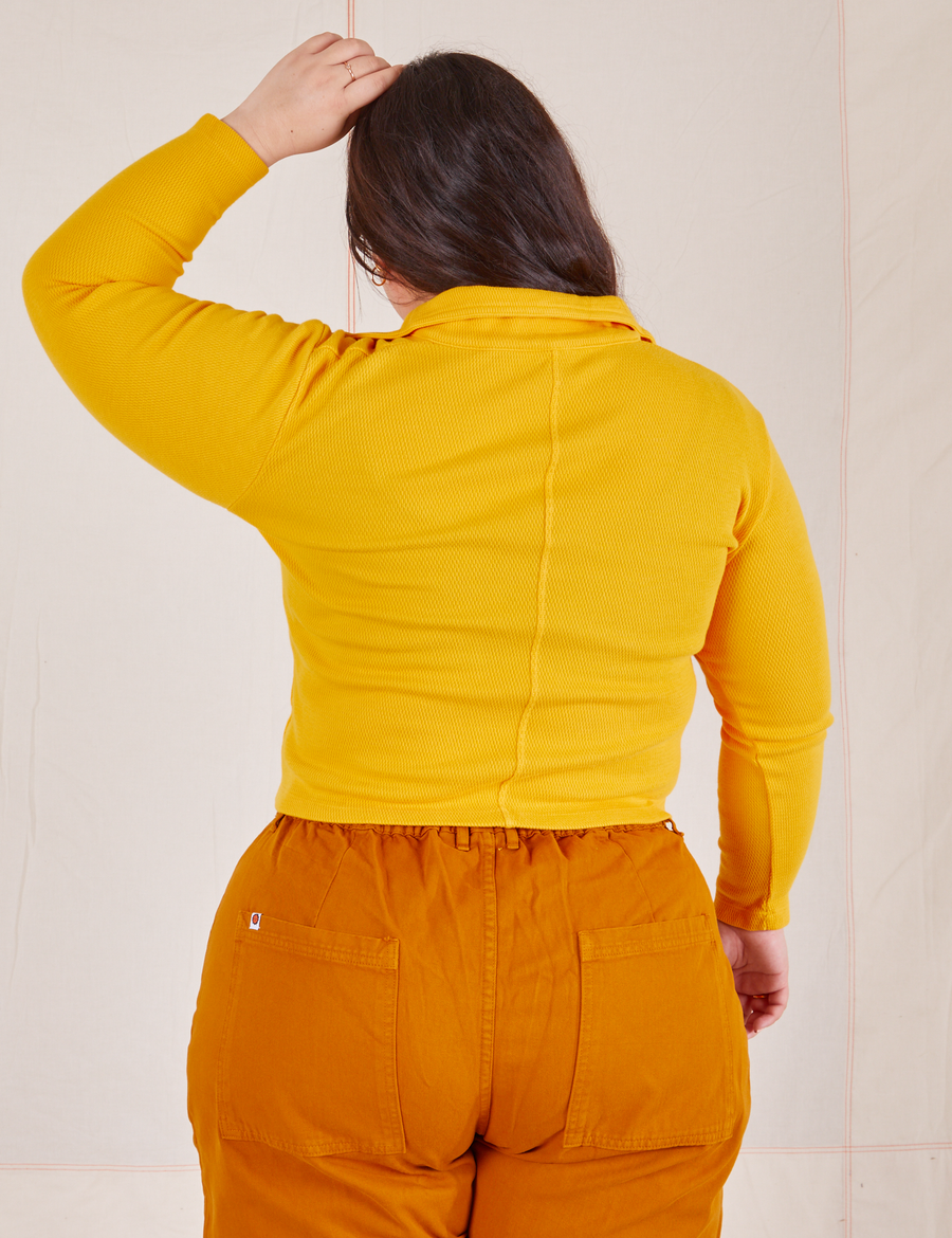 Long Sleeve Fisherman Polo in Sunshine Yellow back view on Ashley wearing spicy mustard Western Pants