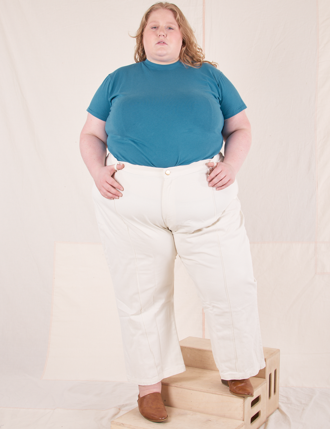 The Organic Vintage Tee in Marine Blue on Catie wearing vintage off-white Western Pants