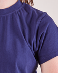 The Organic Vintage Tee in Navy Blue front close up on Alex