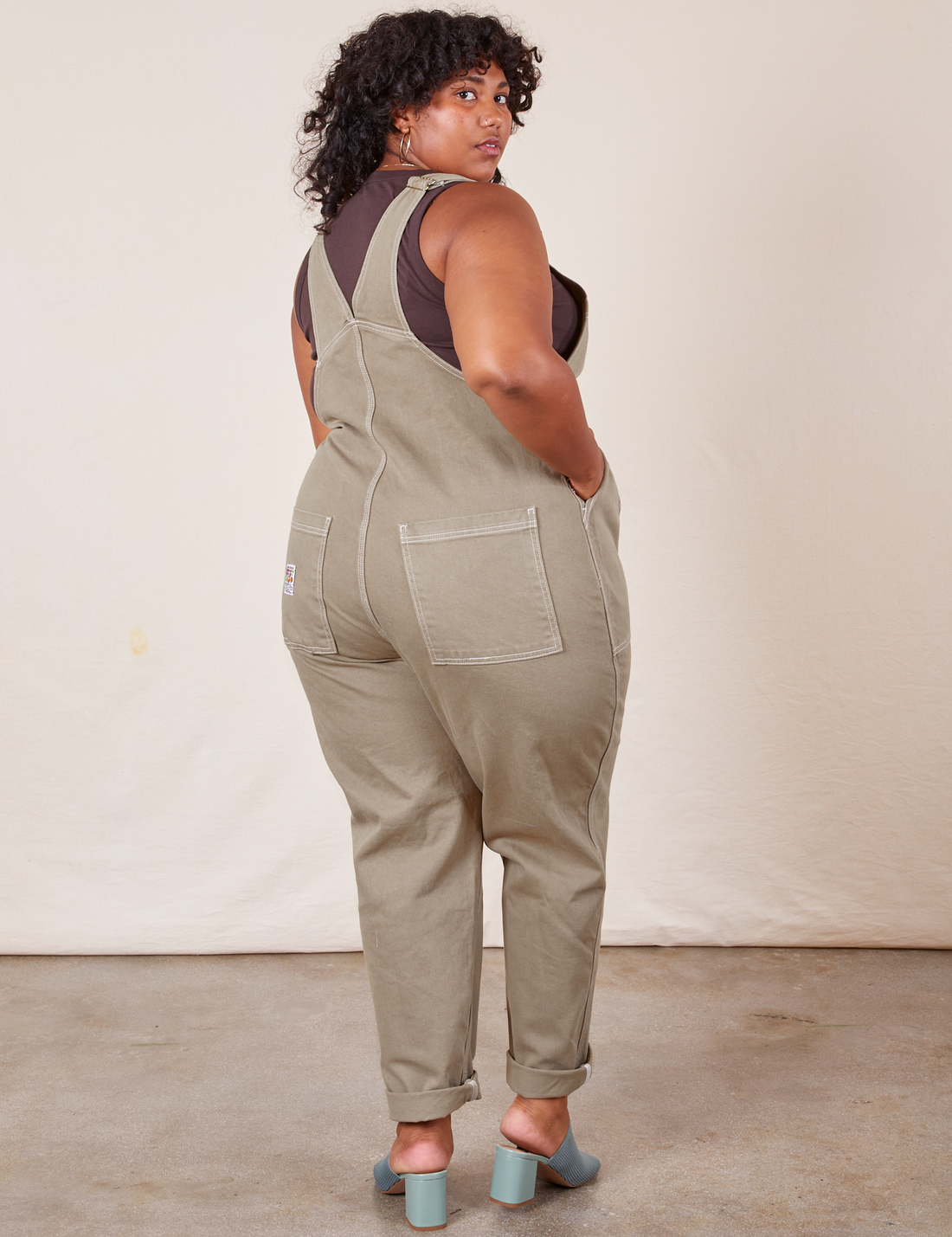 Back view of Original Overalls in Khaki Grey worn by Morgan