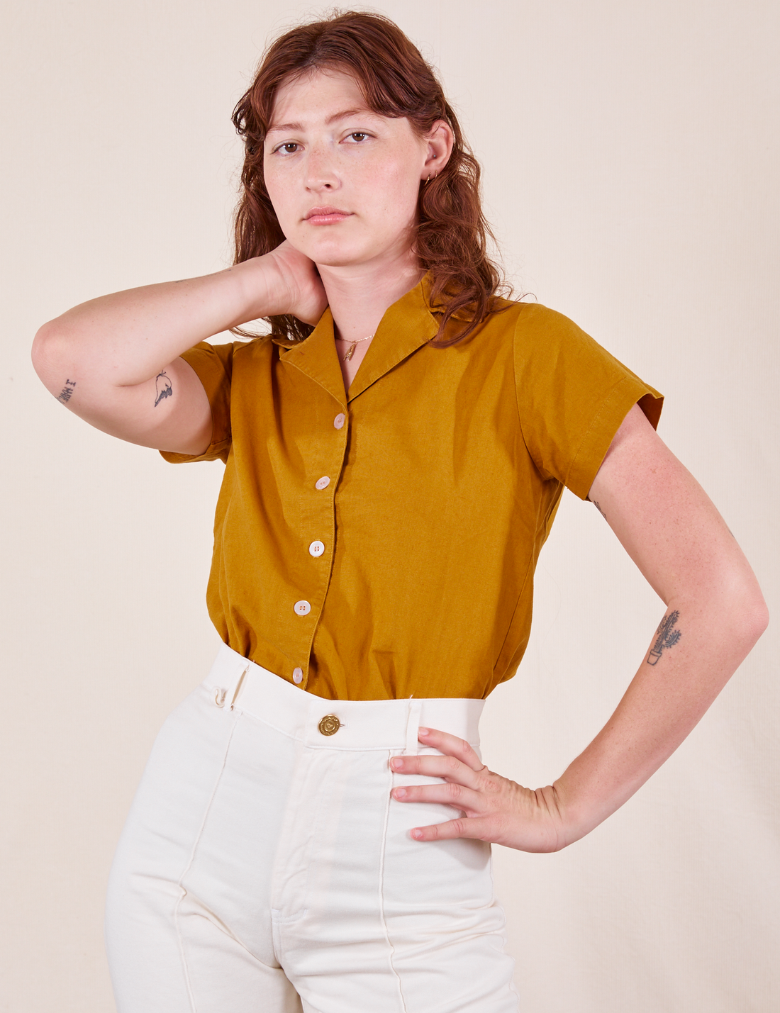 Pantry Button-Up in Spicy Mustard on Alex wearing vintage off-white Western Pants