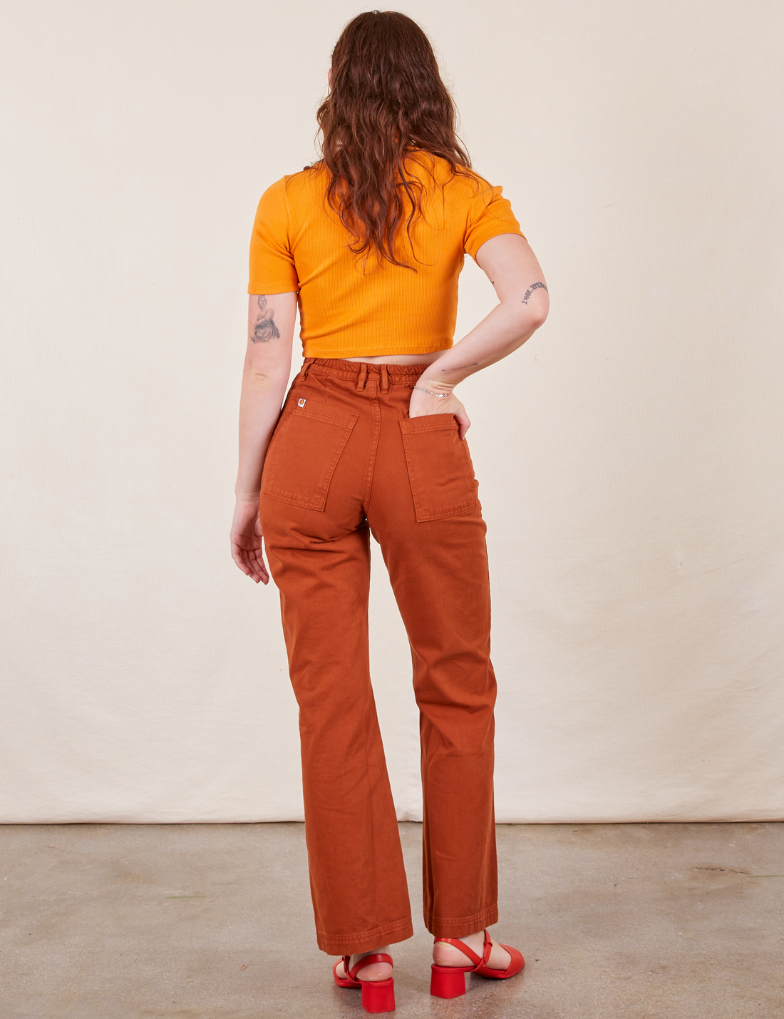 Western Pants in Burnt Terracotta back view on Alex