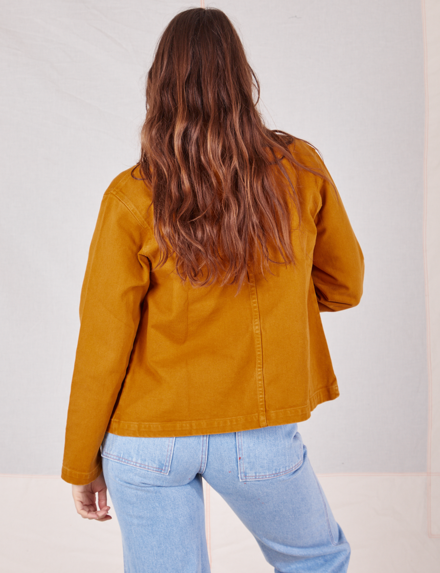 Back view of Denim Work Jacket in Spicy Mustard worn by Allison