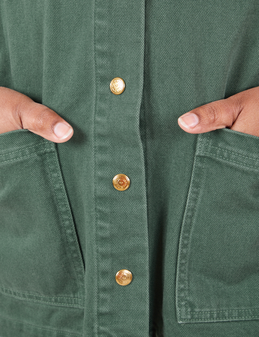 Denim Work Jacket in Dark Emerald Green brass sun baby button close up
