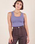 Soraya is wearing P Tank Top in Faded Grape paired with espresso brown Western Pants