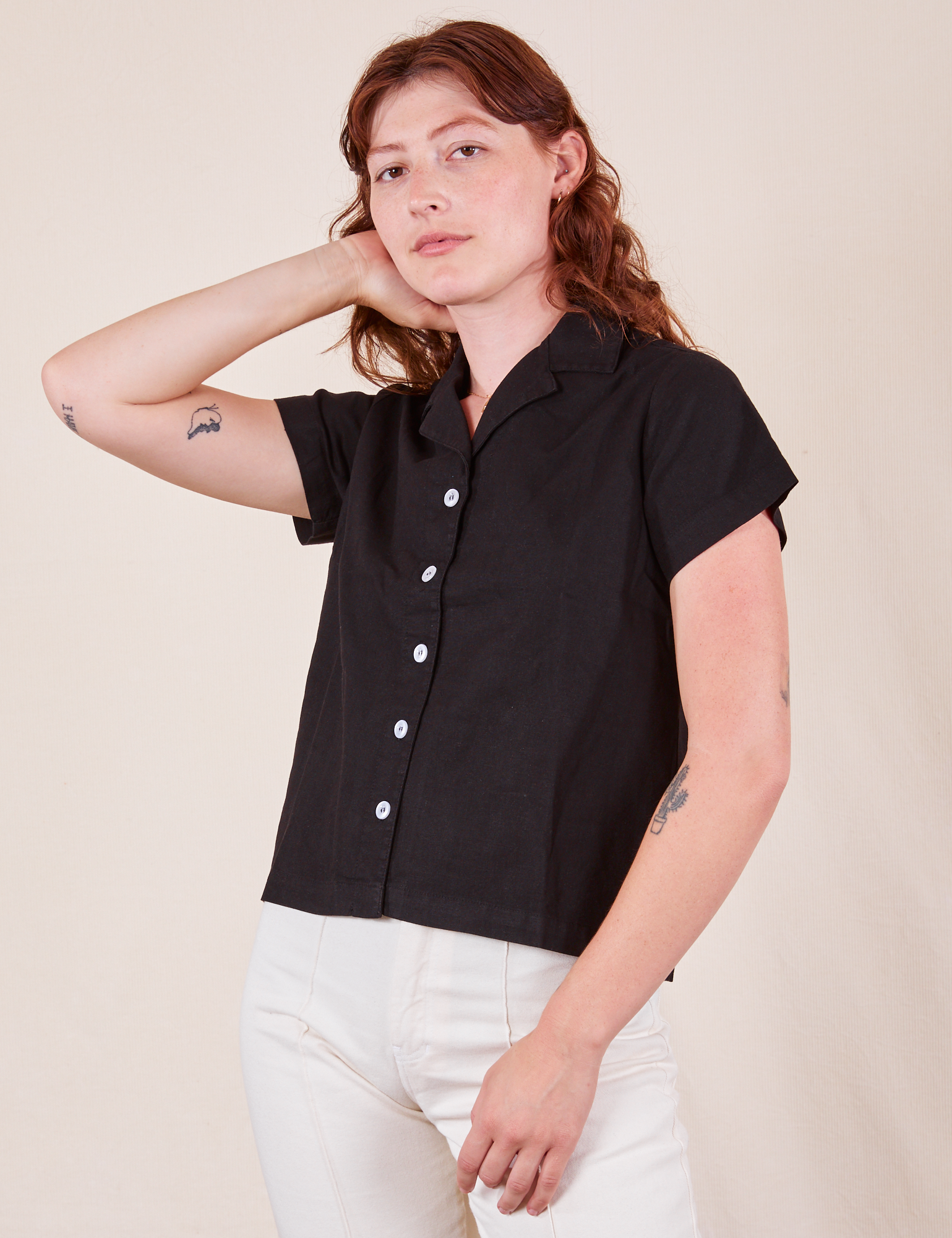 Alex is wearing P Pantry Button-Up in Basic Black