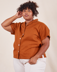 Morgan is wearing 1XL Pantry Button-Up in Burnt Terracotta