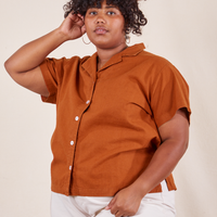 Morgan is wearing 1XL Pantry Button-Up in Burnt Terracotta