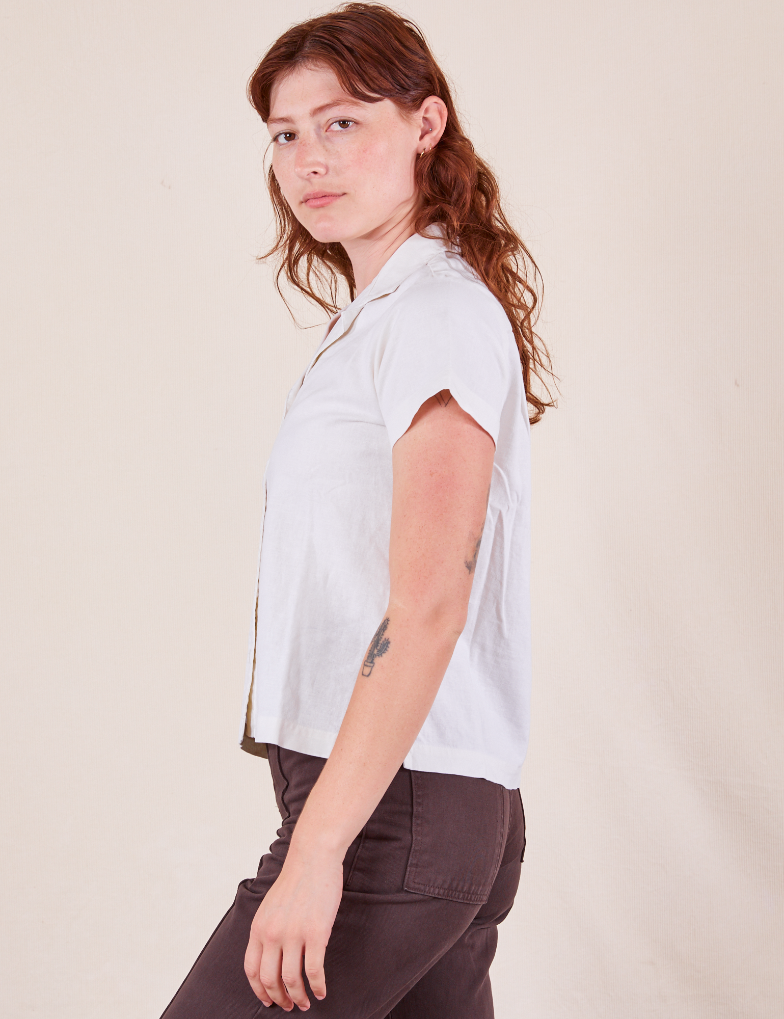 Side view of Pantry Button-Up in Vintage Tee White worn by Alex