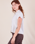 Side view of Pantry Button-Up in Vintage Tee White worn by Alex