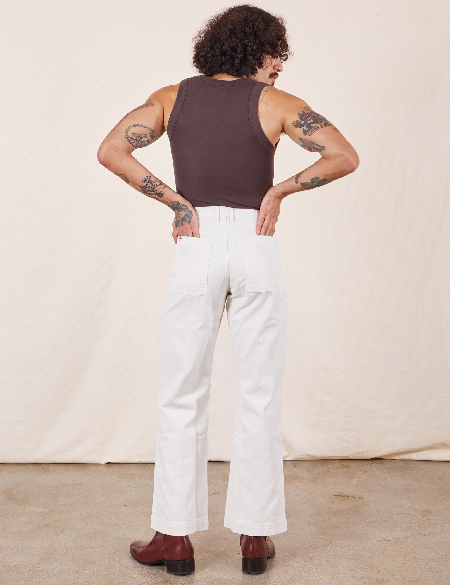 Back view of Western Pants in Vintage Tee Off-White and espresso brown Tank Top on Jesse