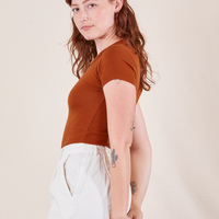 Side view of Baby Tee in Burnt Terracotta on Alex