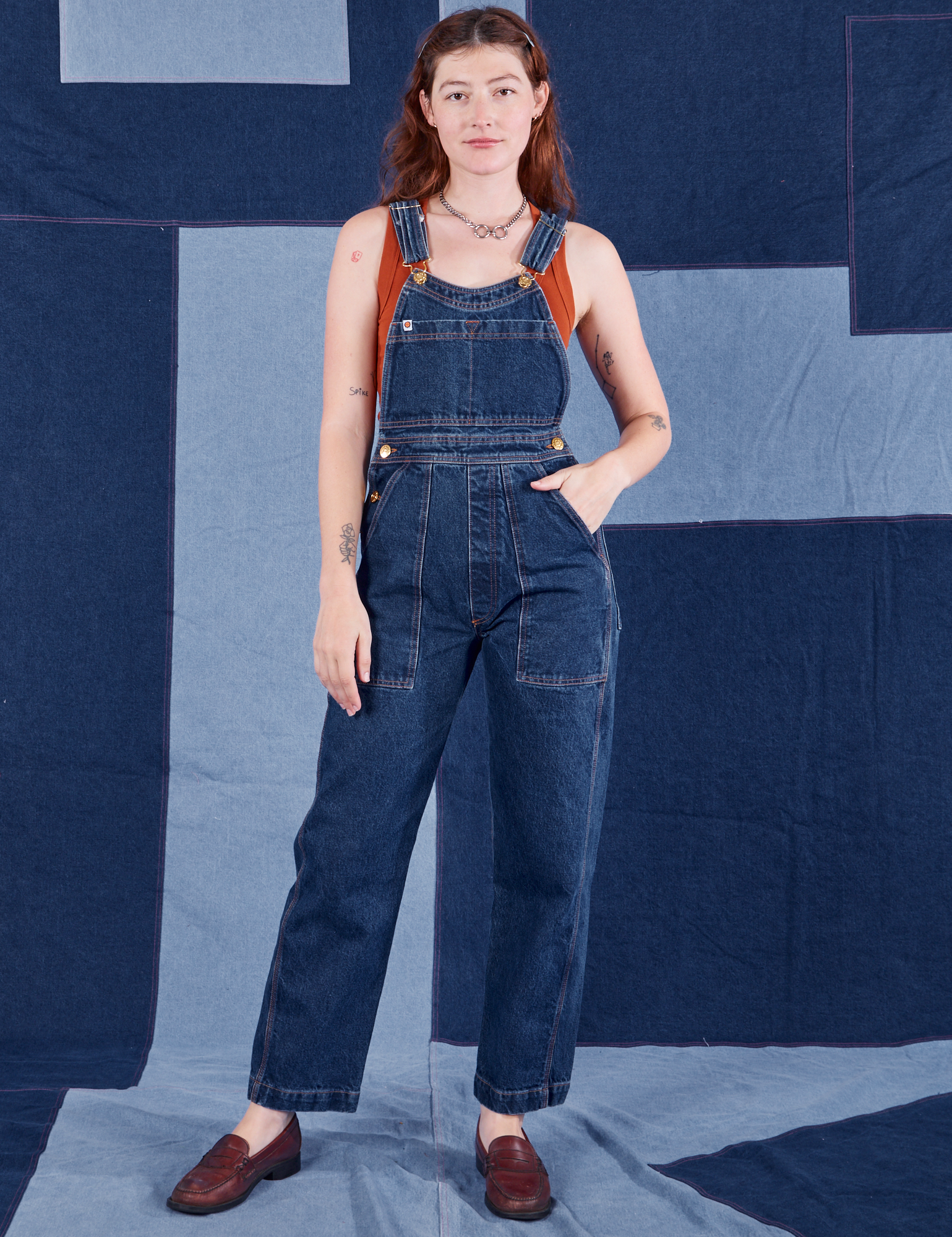 Alex is 5&#39;8&quot; and wearing P Indigo Denim Original Overalls in Dark Wash