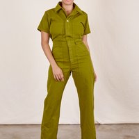 Tiara is 5'4" and wearing S Short Sleeve Jumpsuit in Olive Green