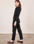 Side view of Everyday Jumpsuit in Basic Black worn by Alex