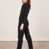Side view of Everyday Jumpsuit in Basic Black worn by Alex