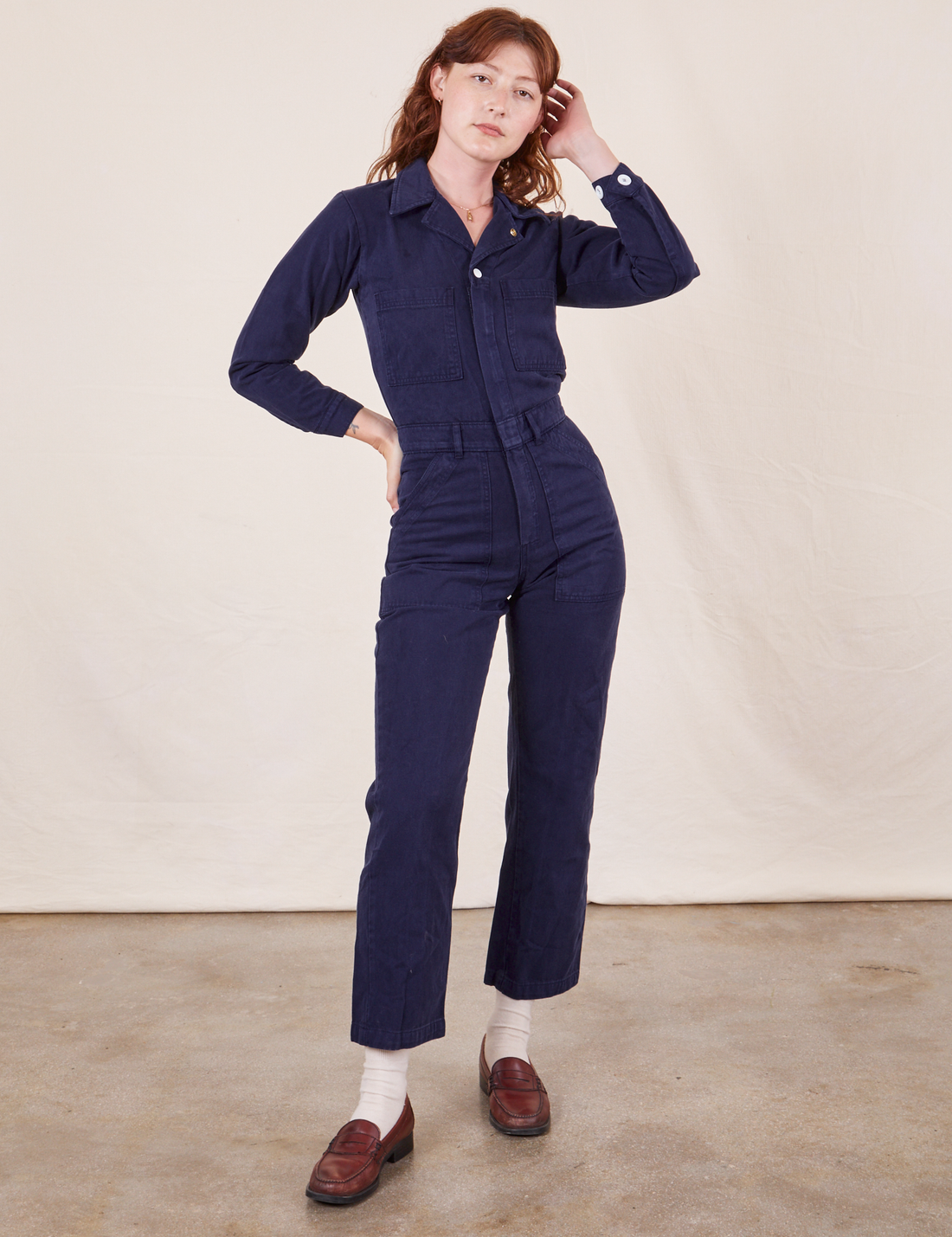 Alex is 5'8" and wearing XS Everyday Jumpsuit in Navy Blue