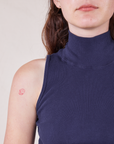 Front close up of Sleeveless Essential Turtleneck in Navy Blue worn by Alex