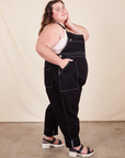 Side view of Original Overalls in Basic Black worn by Mara