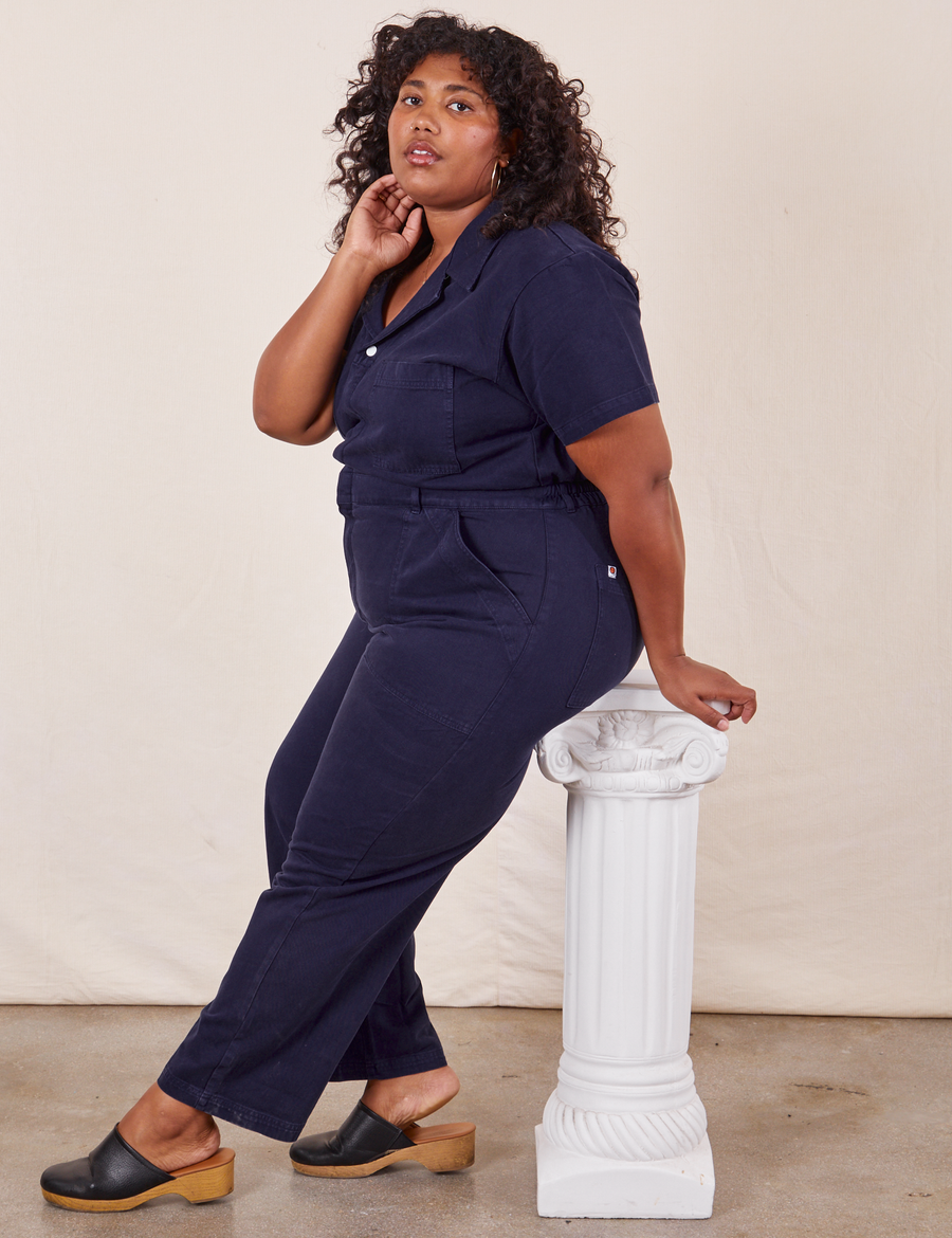 Side view of Short Sleeve Jumpsuit in Navy Blue worn by Morgan