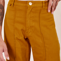 Western Pants in Spicy Mustard front close up on Jesse