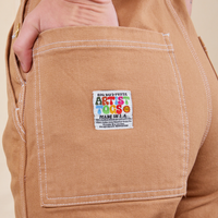Original Overalls in Tan back pocket close up with artist togs label