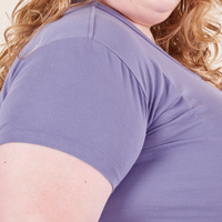 Side arm close up of Baby Tee in Faded Grape on Catie