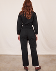 Back view of Everyday Jumpsuit in Basic Black worn by Alex