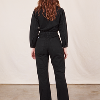 Back view of Everyday Jumpsuit in Basic Black worn by Alex