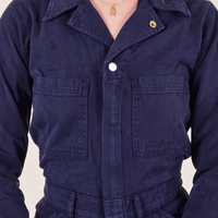 Front close up of Everyday Jumpsuit in Navy Blue worn by Alex