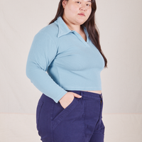 Long Sleeve Fisherman Polo in Baby Blue side view on Ashley wearing navy blue Work Pants