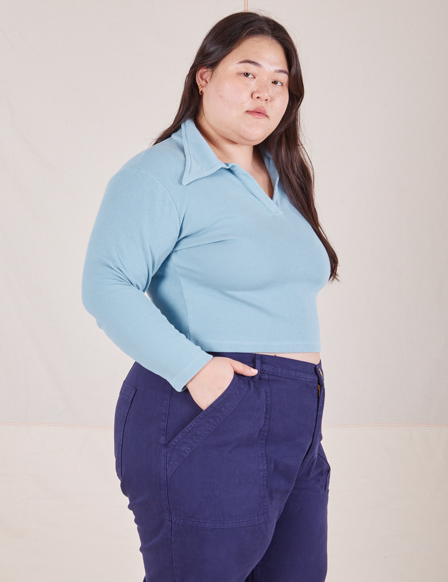 Long Sleeve Fisherman Polo in Baby Blue side view on Ashley wearing navy blue Work Pants