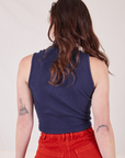 Back view of Sleeveless Essential Turtleneck in Navy Blue worn by Alex