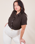 Faye is wearing Pantry Button-Up in Espresso Brown and vintage off-white Western Pants