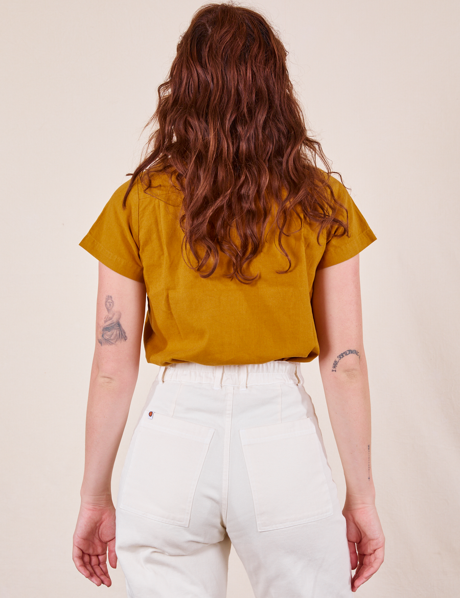 Pantry Button-Up in Spicy Mustard back view on Alex wearing vintage off-white Western Pants
