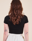 Back view of Baby Tee in Basic Black on Alex