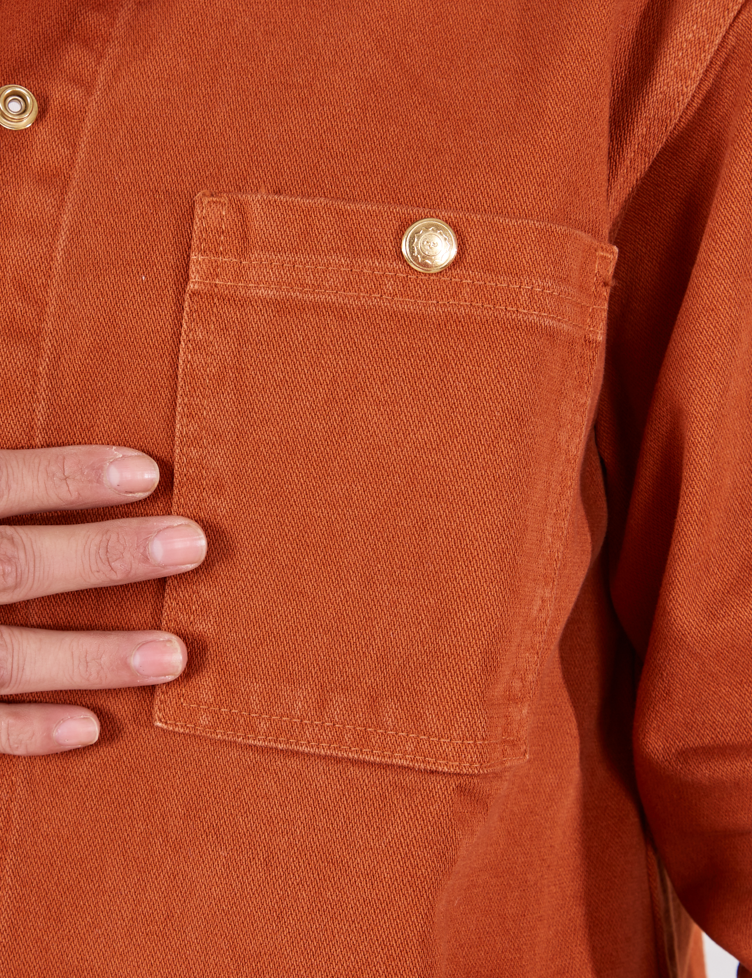 Denim Work Jacket in Burnt Terracotta front pocket close up