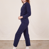 Side view of Everyday Jumpsuit in Navy Blue worn by Alex