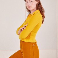 Long Sleeve Fisherman Polo in Sunshine Yellow side view on Alex wearing spicy mustard Western Pants