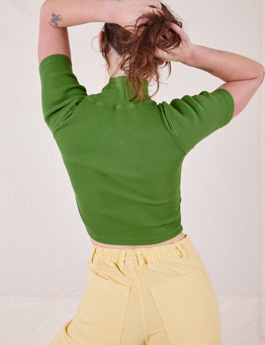 Back view of 1/2 Sleeve Essential Turtleneck in Bright Olive on Alex